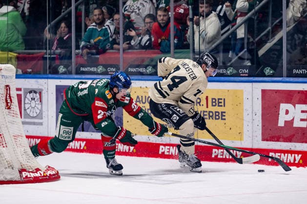 Battle for the Puck: Face-off between Jimmy Lambert of the Augsburger Panther, 23, and Les Lancaster of the Grizzlys Wolfsburg, 74 (GER), Augsburger Panther vs. Grizzlys Wolfsburg, Ice Hockey, DEL, 2026–2027 Season, Matchday 4, October 2, 2026. Photo: HMB Media, Heike Feiner Copyright: HMBxMedia HeikexFeiner