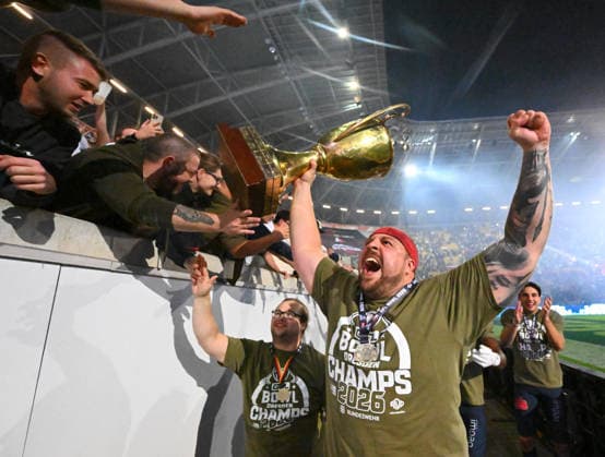 Phillip Most, on the victory lap, celebrating with the trophy, lap around the stadium, championship trophy, the Dresden Monarchs are the 2026 German Champions, GFL Bowl, Bowl, German Championship final between the Dresden Monarchs and the Potsdam Royals, final, American football, German Football League, GFL, Dresden, Rudolf Harbig Stadium Dresden, October 3, 2026,