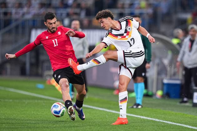 October 6, 2026, xydrx, Men s, Soccer, International Match, U21, European Championship Qualifiers, Germany vs. Georgia, 2026–2027 Season, Schüco Arena Akaki Giunashvili, GEO, No. 17 in a tackle against Noah Darvich, GER, No. 17. DFB regulations prohibit any use of photographs as image sequences and or quasi-video. Copyright: HMBxMedia YannisxDreimann