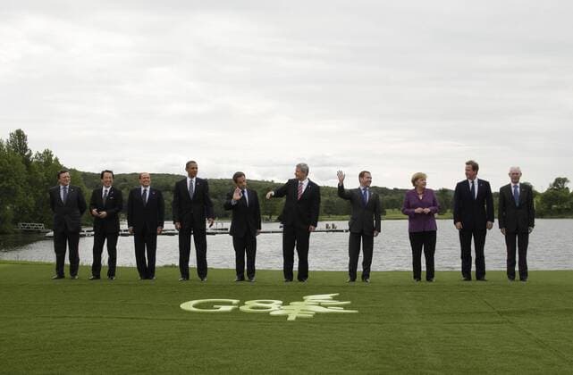 HUNSTVILLE, CANADA. JUNE 27, 2010. European Commission president Jose Manuel Barroso, Japanese Prime Minister Naoto Kan, Italian Prime Minister Silvio Berlusconi, U.S. President Barack Obama, French President Nicolas Sarkozy, Canadian Prime Minister Stephen Harper, President of Russia Dmitry Medvedev, German Chancellor Angela Merkel, British Prime Minister David Cameron and European Council President Herman Van Rompuy (L-R) pose for a group photo at G8 Summit. RE0D2ABC