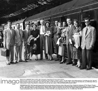 American actors who are to play in Death of A Salesman at the Pheonix Theatre, London. L-R: Del Hughes, Kermit Bloomgarden, Frank Maxwell, Mrs. Maxwell, Ralph Theadore, Katherine Alexander, Kevin McCarthy, Baby and Mrs McCarthy, Anthony La Penna, Mrs La Penna and Sam Main 5th July 1949 UnitedArchives00579906