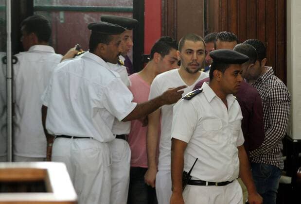 Sept. 8, 2015 - Cairo, Cairo, Egypt - Member of Egyptian Ultras of Zamalek attends his trial in a court in Cairo, on September 8, 2015. At least 22 soccer fans were crushed to death outside an air defense stadium in Cairo after police fired tear gas to break up the crowd waiting in a fenced, narrow corridor to watch. Police accused the fans of attacking the force, and rioting to enter the stadium. On Tuesday, March, 17, 2015 the chief prosecutor general also referred 16 fans to trial, accusing them of belonging to the Muslim Brotherhood Cairo Egypt - ZUMAap3_