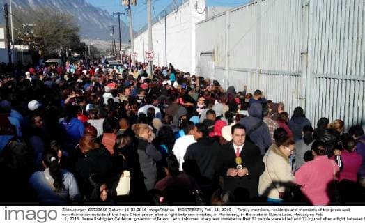 MONTERREY, Feb. 11, 2016 -- Family members, residents and members of the press wait for information outside of the Topo Chico prison after a fight between inmates, in Monterrey, in the state of Nuevo Leon, Mexico, on Feb. 11, 2016. Jaime Rodriguez Calderon, governor of Nuevo Leon, informed in a press conference that 52 people were killed and 12 injured after a fight between two rival fractions of inmates broke in the Topo Chico prison. Str) (ce) MEXICO-MONTERREY-SECURITY-PRISON e STR