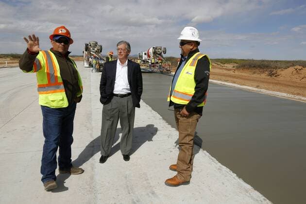 March 31, 2016 - Santa Teresa, NM, U.S. - Westpark developer Chris Lyons, center, supervises a road construction with project manager Fred Reyes, left, and Cemex account manager Tony Chavez in Santa Teresa, New Mexico, Thursday, March 31, 2016. Santa Teresa U.S. - ZUMAab1_