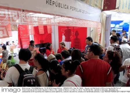 MEXICO CITY, May 21, 2016 -- People visit the booth of China during the 8th Fair of Friend Cultures at the Zocalo Square in Mexico City, capital of Mexico, on May 21, 2016. The 16-day fair, opened on Saturday, attracted the participation of 94 countries and regions to show gaonomic, cultural, educational, artistic and handmade samples. ) (jp) MEXICO-MEXICO CITY-FAIR OF FRIEND CULTURES STR