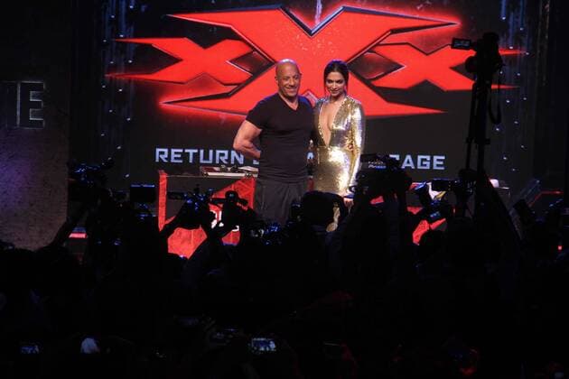 MUMBAI, INDIA - JANUARY 12: Hollywood actor Vin Diesel and Bollywood actor Deepika Padukone during a meet and greet with fans to promote the film xXx: Return of Xander Cage , on January 12, 2017 in Mumbai, India. . xXx: Return of Xander Cage is a 2017 American action film directed by D. J. Caruso and written by F. Scott Frazier. It stars Vin Diesel, Donnie Yen, Deepika Padukone, Kris Wu, Ruby Rose, Tony Jaa, Nina Dobrev, Toni Collette and Samuel L. Jackson. It is the third film in the xXx franchise and a sequel to both xXx (2002) and xXx: State of the Union (2005). (Photo by Pramod Thakur Hindustan Times ) Hollywood Actor Vin Diesel And Bollywood Actor Deepika Padukone Meet Fans In Mumbai