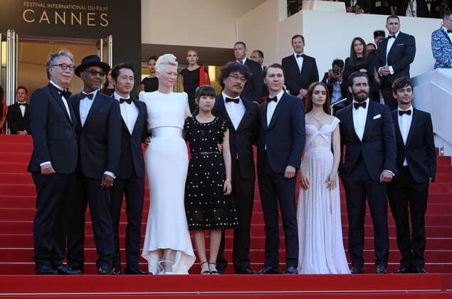 (From L to R) Byung Heebong, Giancarlo Esposito, Steven Yeun, Tilda Swinton, Ahn Seo-Hyun, Bong Joon-Ho, Paul Dano, Lily Collins, Jake Gyllenhaal and Devon Bostic arrive on the red carpet before the screening of the film Okja during the 70th annual Cannes International Film Festival in Cannes, France on May 19, 2017. CAN20170519108 DAVIDxSILPA