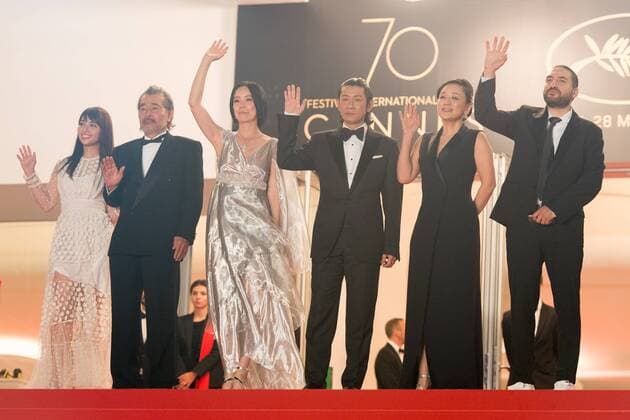 (170524) -- CANNES, May 24, 2017 -- Actress Ayame Misaki, actor Tatsuya Fuji, Director Naomi Kawase, actor Masatoshi Nagase, actress Misuzu Kanno and composer Ibrahim Maalouf (L-R), pose on the red carpet for the screening of the film Radiance in competition at the 70th Cannes Film Festival in Cannes, France, May 23, 2017. ) (jmmn) FRANCE-CANNES-70TH CANNES FILM FESTIVAL-IN COMPETITION-RADIANCE-RED CARPET ChenxYichen