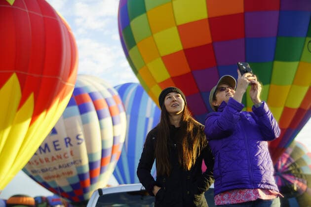 October 8, 2019, Albuquerque, NEW MEXICO, USA: 100819 .Nikki Veit,<cq>, left and Nancy Butcher,<cq>, of Memphis, Tennessee watch balloons take off. Photographed on Tuesday October 8, 2019 . Journal Albuquerque USA - ZUMAab1_ 20191008_zaf_ab1_009 Copyright: xAdolphexPierre-Louisx