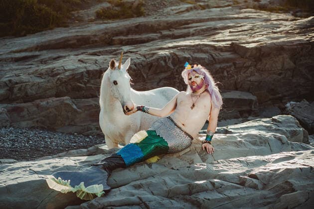 November 25, 2019, Newfoundland and Labrador, Canada: IN PHOTO: Model Mark Adams (Valveeta) ..A group of bearded Canadian men have been transformed into mermen for a hilarious charity calendar...The Newfoundland and Labrador Beard and Moustache Club (NLBMC) have raised over £291,000 ($500,000) for local charities from sales of over 30,000 calendars worldwide and now the men are back for the 2020 edition sporting facial hair with fishtails and scales...Dubbed the â€oe2020 MerBâ€⠢ys Calendarâ€Â, it combines the word Merman with the Newfoundland term â€oebâ€⠢y†(pronounced â€oebyeâ€Â), a term similar to the word buddy. ..Hasan Hai, founder of the NLBMC and the MerBâ€⠢ys project, explains: â€oeOur club embraces healthy and progressive expressions of masculinity; we delight in breaking down outdated - ZUMAc218 20191125_zia_c218_023 Copyright: xCOVERxImagesx