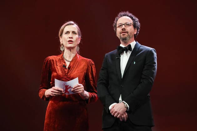 (200221) -- BERLIN, Feb. 21, 2020 -- Berlinale Executive Director Mariette Rissenbeek (L) and Berlinale Artistic Director Carlo Chatrian attend the opening ceremony of the 70th Berlin International Film Festival in Berlin, capital of Germany, Feb. 20, 2020. The 70th Berlin International Film Festival, or as it s more commonly known, the Berlinale, kicked off on Thursday with a literary drama My Salinger Year . A total of 18 films have made it into this year s competition category and they will compete for the Golden Bear for best film, and other individual awards, the Silver Bears. Shan Yuqi) GERMANY-BERLIN-BERLINALE 2020-OPENING DanxYuqi