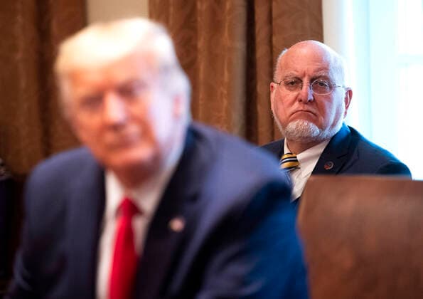 March 18, 2020, Washington, District of Columbia, USA: Director of the Centers for Disease Control and Prevention Dr. Robert Redfield, right, listens as United States President Donald J. Trump speaks to reporters as he holds a meeting with nurses on the COVID-19 response at the White House in Washington, DC, March 18, 2020, in Washington, D.C. .Credit: Pool via CNP Washington USA - ZUMAs152 20200318_zaa_s152_064 Copyright: xKevinxDietschx