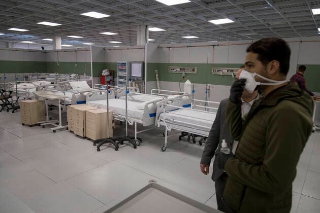 March 21, 2020, Tehran, Iran: Iranian workers set a temporary established emergency hospital in a part of the world s largest shopping mall complex called Iran Mall , to treat patients infected with the COVID-19 disease, caused by the SARS-CoV-2 coronavirus, in the northwest of the capital of Tehran, Iran. Iran is one of the countries most affected by the devastating pandemic of the coronavirus. According to the latest report by the Ministry of Health, there are at least 20,610 confirmed cases of coronavirus infections and 1,556 people have died from the virus throughout Iran. Tehran Iran - ZUMAf146 20200321_zip_f146_020 Copyright: xRouzbehxFouladix