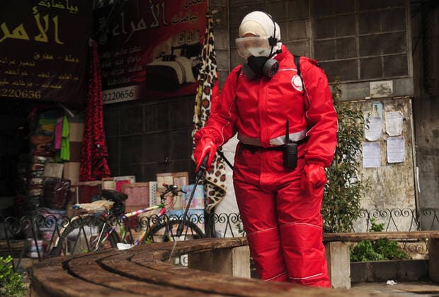 March 21, 2020, Damascus, Damascus, Syrian Arab Republic: Syrian workers disinfect the old market, as a preventive measure amid fears of the spread of the coronavirus, in Damascus, Syria, on March 21, 2020. Even though no cases of coronavirus Covid-19 have yet been reported in the city, some people prefer to take precautionary measures Damascus Syrian Arab Republic - ZUMAap3_ 20200321_zaf_ap3_062 Copyright: xOmarxEstwanix