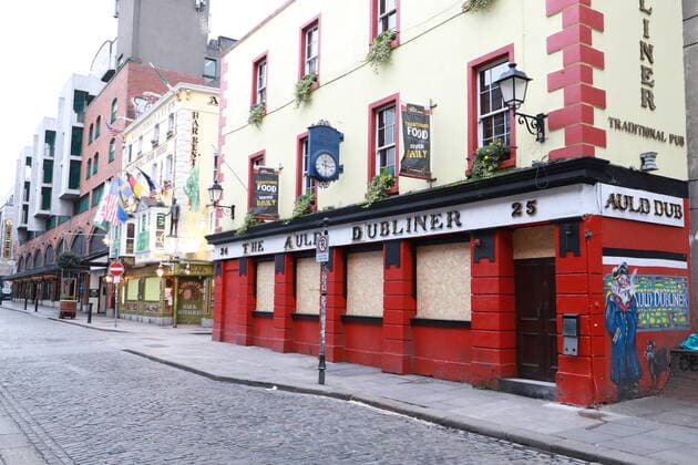 (200324) -- DUBLIN, March 24, 2020 (Xinhua) -- A street with shutdown shops is seen in downtown Dublin, Ireland, March 23, 2020. Two more COVID-19 patients died while another 219 new coronavirus cases were confirmed in Ireland on Monday, the country s Department of Health said in a statement. To date, there have been a total of 1,125 confirmed cases of COVID-19 and six COVID-19-related deaths in the country, said the statement, adding that the latest two victims of the disease are both male from the east of Ireland. (Xinhua) IRELAND-DUBLIN-COVID-19-CONFIRMED CASES