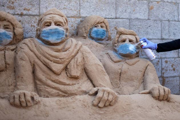 April 3, 2020, Gaza City, Gaza Strip, Palestinian Territory: A Palestinian artist Rana el-Ramlawi, 23, creates a sand sculpture stay home during awareness campaign about the spread of coronavirus disease (COVID-19), at her house Gaza city, on April 3, 2020. The United Nations has warned that a COVID-19 outbreak in Gaza could be disastrous, given the high poverty rates and weak health system in the coastal strip under Israeli blockade since 2007. Authorities in Gaza have said that more than 2,700 Palestinians are in home-isolation, mostly people who had returned from Egypt Gaza City Palestinian Territory - ZUMAap3_ 20200403_zaf_ap3_032 Copyright: xMahmoudxAjjourx