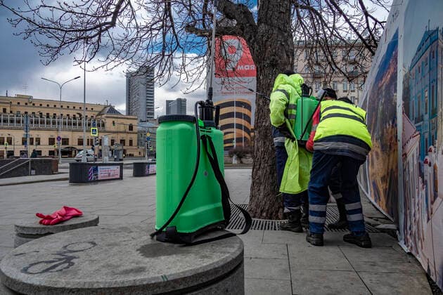 April 5, 2020. Russia. Moscow on coronavirus lockdown. Utility workers wash a pedestrian underpass with disinfectant. Moscow authorities imposed home isolation for all Moscow residents, regardless of their age, and restrictions on movement within the city, effective since March 30, 2020, as a measure to contain the spread of the COVID-19 coronavirus infection. Violations of the stay-at-home order carry fines ranging from 1,000 to 40,000 rubles for non-infected people, and up to 1m rubles or imprisonment for up to 3 years for infected people, depending on the severity of consequences. KonstantinxKokoshkin