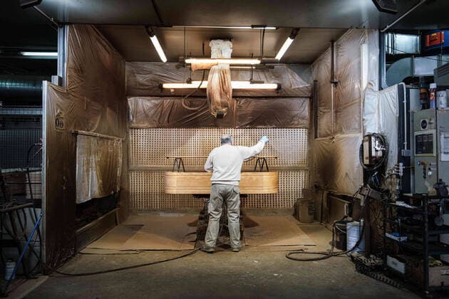 April 8, 2020, Barcelona, Spain: A worker paints a coffin in the largest coffin factory in Catalonia...Coronavirus outbreak in Spain has already killed 14,659 people. The large number of deaths has forced Eurocoffin, the main coffin factory in Catalonia, to triple its production, from 50 to 150 coffins per day. Isolation and quarantine prevent family members from gettting infected or infect others. In Spain today, the pandemic leaves numbers of 146,690 infected and 48,021 recovered. Barcelona Spain - ZUMAs197 20200408_zaa_s197_161 Copyright: xPabloxMiranzox