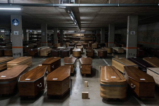 April 8, 2020, Barcelona, Spain: Coffins full of dead bodies from Coronavirus (Covid-19) in the Collserola mortuary parking lot. This space has been converted into a morgue due to the increase in deaths of Covid19...Coronavirus outbreak in Spain has already killed 14,659 people. The large number of deaths has forced Eurocoffin, the main coffin factory in Catalonia, to triple its production, from 50 to 150 coffins per day. Isolation and quarantine prevent family members from gettting infected or infect others. In Spain today, the pandemic leaves numbers of 146,690 infected and 48,021 recovered. Barcelona Spain - ZUMAs197 20200408_zaa_s197_162 Copyright: xPabloxMiranzox