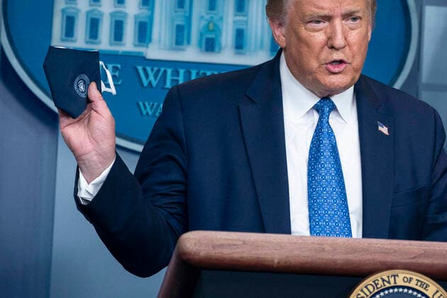 July 22, 2020, Washington, District of Columbia, USA: United States President Donald J. Trump holds a face mask during a news conference at the White House in Washington, D.C., U.S., on Wednesday, July 22, 2020. President Trump addressed the coronavirus pandemic, the 2020 presidential election and a new anti-crime initiative called Operation Legend Washington USA - ZUMAs152 20200722_zaa_s152_174 Copyright: xSarahxSilbigerx