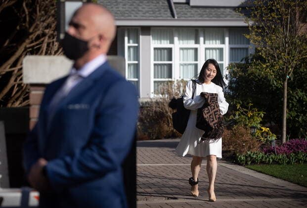 March 31, 2021, Vancouver, BC, Canada: Meng Wanzhou, chief financial officer of Huawei, leaves her home to attend her extradition hearing at B.C. Supreme Court, in Vancouver, on Wednesday, March 31, 2021. Vancouver Canada - ZUMAc35_ 20210331_zaf_c35_043 Copyright: xDarrylxDyckx
