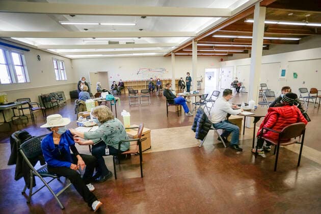 (210410) -- RICHMOND, April 10, 2021 -- People receive the COVID-19 vaccines inside a vaccination clinic in Richmond, British Columbia, Canada, on April 10, 2021. As of Saturday afternoon, Canada reported 5,986 new cases of COVID-19, bringing the cumulative total to 1,051,246, including 23,282 deaths, according to CTV. (Photo by Xinhua) CANADA-RICHMOND-COVID-19-VACCINATION LiangxSen