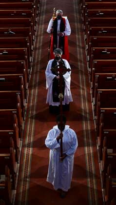 April 17, 2021, Ottawa, on, Canada: The Crucifer leads Reverend Elizabeth J. Bretzlaff, Dean of Ottawa and Rector of Christ Church Cathedral and Reverend Shane A. D. Parker, Bishop of the Anglican Diocese of Ottawa, as the recede following the National Commemorative Ceremony in honour of Prince Philip, The Duke of Edinburgh, at Christ Church Cathedral in Ottawa on Saturday, April 17, 2021. Ottawa Canada - ZUMAc35_ 20210417_zaf_c35_016 Copyright: xSeanxKilpatrickx