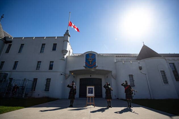 April 17, 2021, Vancouver, BC, Canada: Commanding Officer Lt. Col Ed Haverstock, from left to right, Regimental Sgt. Major Rob Deans and Pipe Major Dan Bell salute after the playing of the piper s lament in honour of Britain s Prince Philip while the Canadian flag flies at half mast outside The Seaforth Highlanders of Canada armoury in Vancouver, on Saturday, April 17, 2021. Prince Philip was the Colonel-in-Chief of The Seaforth Highlanders of Canada, an Army Reserve infantry regiment of 39 Canadian Brigade Group garrisoned in Vancouver. Vancouver Canada - ZUMAc35_ 20210417_zaf_c35_033 Copyright: xDarrylxDyckx