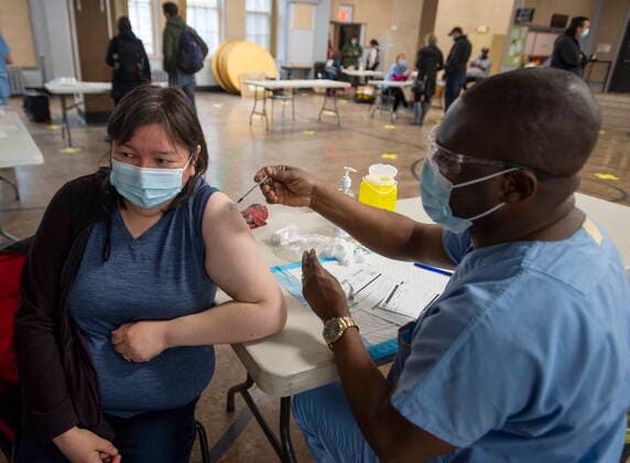 April 30, 2021, Montreal, PQ, Canada: Lucy Stocken, who is Cree, gets the Pfizer COVID-19 vaccination at a mobile clinic for members of First Nations and their partners, in Montreal, Friday, April 30, 2021. Montreal Canada - ZUMAc35_ 20210430_zaf_c35_016 Copyright: xRyanxRemiorzx