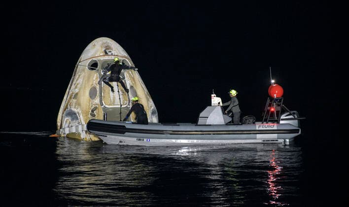 May 2, 2021, Panama City, Florida, USA: Support teams work around the SpaceX Crew Dragon Resilience spacecraft shortly after it landed with NASA astronauts Mike Hopkins, Shannon Walker, and Victor Glover, and Japan Aerospace Exploration Agency (JAXA) astronaut Soichi Noguchi aboard in the Gulf of Mexico off the coast of Panama City, Florida, Sunday, May 2, 2021. NASA™s SpaceX Crew-1 mission was the first crew rotation flight of the SpaceX Crew Dragon spacecraft and Falcon 9 rocket with astronauts to the International Space Station as part of the agency™s Commercial Crew Program..Mandatory Credit: NASA via CNP Panama City USA - ZUMAs152 20210502_zaa_s152_007 Copyright: xBillxIngallsx