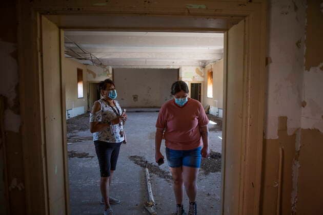 June 1, 2021, Muskowekwan First Nation, SK, Canada: Melvina Asapace, left, walks through the halls of the former Muscowequan Indian Residential School, where her brother attended before a press conference and prayer vigil at the former Muscowequan Indian Residential School, one of the last residential schools to close its doors in Canada in 1997 and the last fully intact residential school still standing in Saskatchewan at Muskowekwan First Nation, Sask., on Tuesday, June 1, 2021. The vigil was in response to the remains of 215 children recently found at the Kamloops Indian Residential School. Muskowekwan First Nation Canada - ZUMAc35_ 20210601_zaf_c35_077 Copyright: xKaylexNeisx