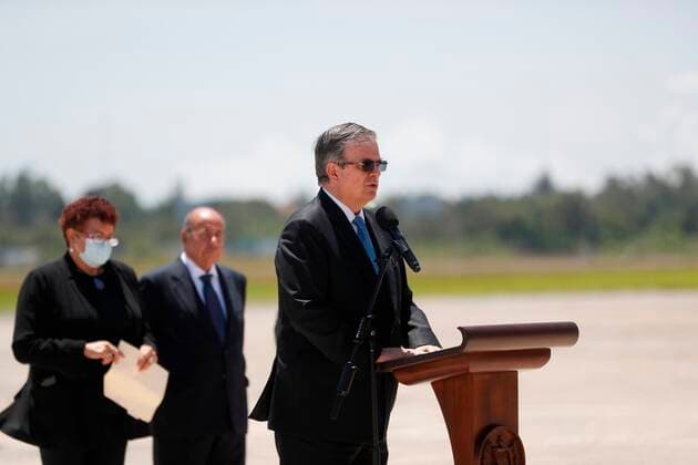 The Mexican Foreign Minister, Marcelo Ebrard, speaks during the donation to Guatemala of 150,000 doses of AstraZeneca vaccines on the central airfield runway of the Guatemalan Air Force, today, in Guatemala City, Guatemala, 24 June 2021. The Mexican Foreign Minister, Marcelo Ebrard, personally delivered a donation of 150,000 doses of AstraZeneca vaccines against covid-19 in Guatemala on Thursday and assured that a new identical shipment will be given soon. Ebrard arrived in the Central American country at noon on a Mexican Air Force plane and was received by Guatemalan Vice Chancellor Eduardo Hernandez and the Minister of Public Health and Social Assistance, Amelia Flores, for a brief ceremony to deliver the vaccines. EFE Esteban Biba Mex Copyright: xEstebanxBibax AME8232 20210624-70135da05672f44724369a0f1af081172bd32f8b
