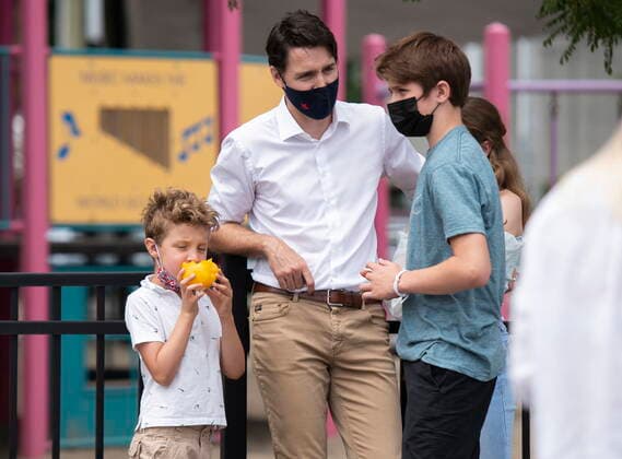 July 1, 2021, Ottawa, on, Canada: Hadrien Trudeau, son of Prime Minister Justin Trudeau, eats a fresh yellow pepper as he stands with his brother Xavier, as they family went shopping at the Parkdale Public Market in Ottawa on Canada Day, Thursday, July 1, 2021. Ottawa Canada - ZUMAc35_ 20210701_zaf_c35_037 Copyright: xJustinxTangx
