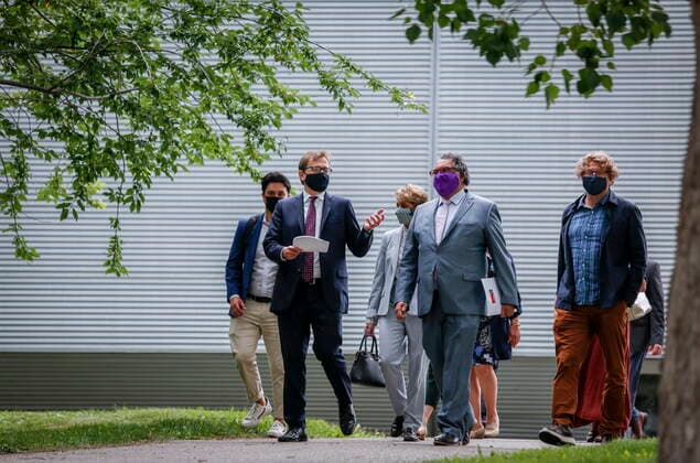 July 20, 2021, Calgary, ab, Canada: Federal Environment Minister Jonathan Wilkinson, second from left, and Calgary mayor Naheed Nenshi, second from right, arrive to make an announcement about the Springbank dam, after it was deemed earlier this month that it could proceed after an environmental assessment determined it is not likely to cause significant adverse effects, in Calgary, Alta., Tuesday, July 20, 2021. Calgary Canada - ZUMAc35_ 20210720_zaf_c35_053 Copyright: xJeffxMcintoshx