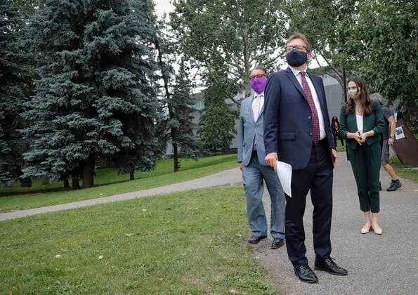July 20, 2021, Calgary, ab, Canada: Federal Environment Minister Jonathan Wilkinson, centre, and Calgary mayor Naheed Nenshi, left, arrive to make an announcement about the Springbank dam, after it was deemed earlier this month that it could proceed after an environmental assessment determined it is not likely to cause significant adverse effects, in Calgary, Alta., Tuesday, July 20, 2021. Calgary Canada - ZUMAc35_ 20210720_zaf_c35_056 Copyright: xJeffxMcintoshx