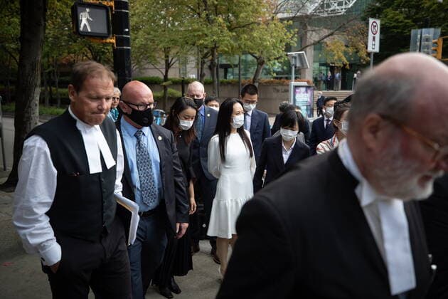 August 17, 2021, Vancouver, BC, Canada: Meng Wanzhou, centre, chief financial officer of Huawei, leaves B.C. Supreme Court during a break from her extradition hearing, in Vancouver, on Tuesday, August 17, 2021. Vancouver Canada - ZUMAc35_ 20210817_zaf_c35_034 Copyright: xDarrylxDyckx