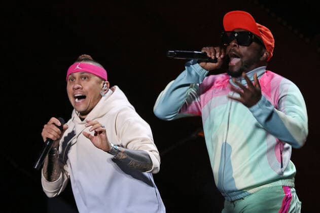 Taboo (L) and will.i.am of the Black Eyed Peas perform during the Global Citizen Live concert in Paris on Saturday, September 25, 2021. The concert, held at the base of the Eiffel Tower, is one of several taking place in cities around the world including New York, Los Angeles, London, Sydney, Lagos, Rio, Mumbai and Seoul. The event aims to raise awareness for issues related to the climate and ending poverty. PARI20210925042 DAVIDxSILPA