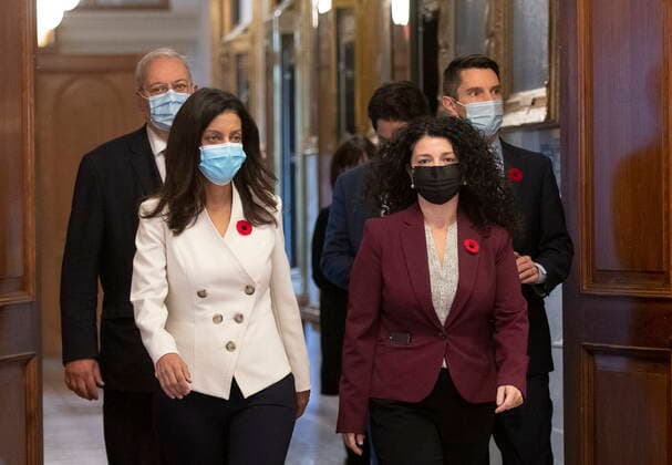 November 2, 2021, QUEBEC, PQ, Canada: Quebec Liberal Leader Dominique Anglade, left, walks to a news conference to responds to reporters questions over the dismissal of MNA Marie Montpetit from the Liberal caucus, Tuesday, November 2, 2021 at the legislature in Quebec City. Anglade is accompanied by Caucus president Pierre Arcand, from the left, party Whip Filomena Rotiroti and Official Opposition House Leader Andre Fortin. QUEBEC Canada - ZUMAc35_ 20211102_zaf_c35_021 Copyright: xJacquesxBoissinotx