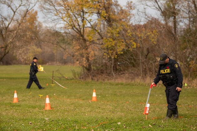 November 9, 2021, Brantford, ON, Canada: Ontario Provincial Police members take measurements during the search for unmarked graves using ground-penetrating radar on the 500 acres of the lands associated with the former Indian Residential School, the Mohawk Institute, in Brantford, Ont., Tuesday, November 9, 2021. Brantford Canada - ZUMAc35_ 20211109_zaf_c35_024 Copyright: xNickxIwanyshynx