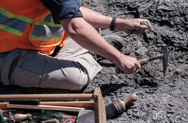 May 11, 2022, Lethbridge, AB, Canada: Darren Tanke, a technician from the Royal Tyrell Museum of Palaeontology, works on preserving a mosasaur fossil, Wednesday, May 11, 2022, at the KORITE mine south of Lethbridge, Alta. Lethbridge Canada - ZUMAc35_ 20220511_zaf_c35_099 Copyright: xDavidxRossiterx