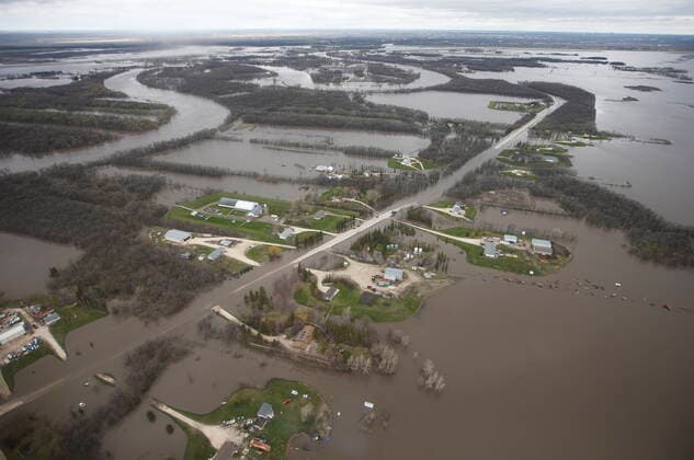 May 15, 2022, WINNIPEG, MB, CANADA: St MaryöÄÃ s Road, which runs between Winnipeg and St Adolphe, Man., is closed due to Red River flooding south of Winnipeg, Sunday, May 15, 2022. WINNIPEG CANADA - ZUMAc35_ 20220515_zaf_c35_088 Copyright: xJohnxWoodsx