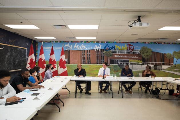 July 5, 2022, Etobicoke, ON, CANADA: Dr. Akwatu Khenti, left to right, Prime Minister Justin Trudeau, Toronto Raptors President Masai Ujiri and Barbara Thompson participate in a gun violence roundtable at Rexdale Community Centre in Etobicoke, Ont., on Tuesday, July 5, 2022. Etobicoke CANADA - ZUMAc35_ 20220705_zaf_c35_003 Copyright: xTijanaxMartinx
