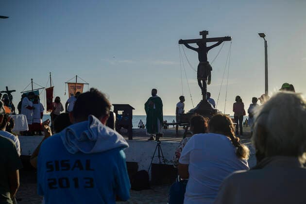 August 28, 2022, Sisal, Yucatan, Mexico: August 28, 2022, Sisal, Mexico: Believers take part during the mass as part of annual celebration of the Black Christ. on the last Sunday of August in the port of Sisal, a mass is held to the Black Christ at the beginning of the day, a procession is carried out by the sea with the belief that when walking it blesses the season and more octopus comes out. Custodians load the Black Christ to place it on their boat. on August 28, 2022 in Sisal, Mexico. Sisal Mexico - ZUMAe321 20220828_zia_e321_050 Copyright: xMarianaxGutierrez xEyepixxGroupx