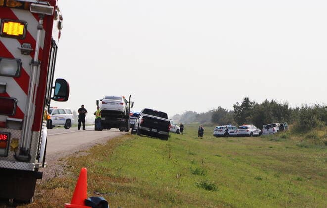 September 7, 2022, Rosthern, SK, CANADA: Police and investigators are seen at the side of the road outside Rosthern, Sask., on Wednesday, Sept. 7, 2022. RCMP say Myles Sanderson, a suspect in a deadly stabbing rampage northeast of Saskatoon over the weekend, has been taken into custody near the town of Rosthern on the fourth day of a massive manhunt. Rosthern CANADA - ZUMAc35_ 20220907_zaf_c35_104 Copyright: xKellyxGeraldinexMalonex