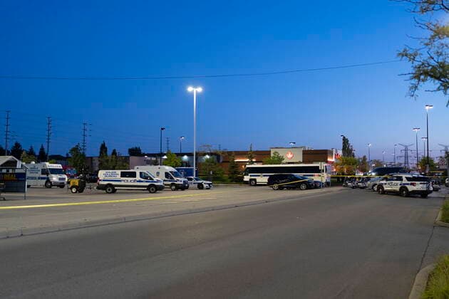 September 12, 2022, Mississauga, ON, CANADA: An overall view of the scene of a shooting in Mississauga, Ont., Monday, Sept. 12, 2022. Cst. Andrew Hong, of the Toronto Police Service, was fatally shot after two separate shootings left two dead and three injured in the Greater Toronto Area on Monday afternoon. Mississauga CANADA - ZUMAc35_ 20220912_zaf_c35_183 Copyright: xArlynxMcadoreyx