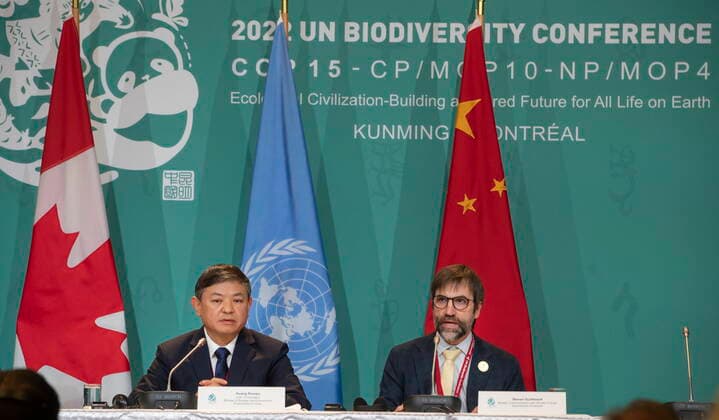 December 17, 2022, Montreal, PQ, CANADA: Huang Runqiu, left, President of the COP 15 and Minister of Ecology and Environment of China listens as Steven Guilbeault, Minister of Environment and Climate Change Canada, speaks during a press conference at the COP 15 summit on biodiversity, in Montreal, Saturday, Dec. 17, 2022. Montreal CANADA - ZUMAc35_ 20221217_zaf_c35_038 Copyright: xPeterxMccabex