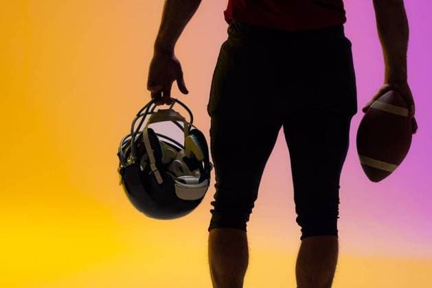Midsection of caucasian male american football player with neon purple and yellow lighting Midsection of caucasian male american football player with neon purple and yellow lighting. Sport, movement, training and active lifestyle concept., model released, , property released, Cape Town, South Africa, 2022-09-07T22:00:00.000Z, 3809600.jpg, people,midsection,caucasian male,american football,football player,neon,purple,yellow,lighting,sport,movement,training,active lifestyle,concept,exercise,fitness,active,workout,athlete,activity,recreation,fit,design,athletic,background,abstract,lifestyle,color,illustration,motion,healthy,bright,gym,graphic,caucasian,male,american,football,player Mid Adult,Man,Male,White