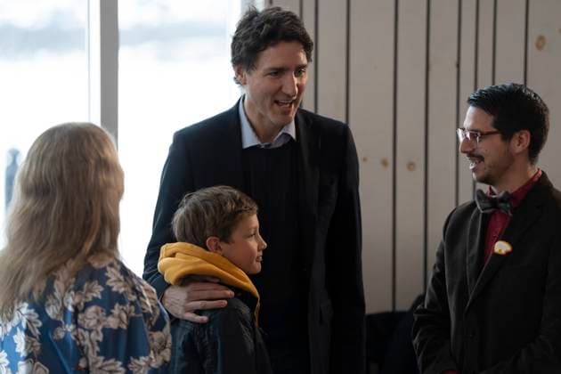 May 12, 2023, Nain, NL, Canada: Prime Minister Justin Trudeau, centre, holds his son Hadrien, 9, prior to a meeting of the Inuit-Crown Partnership Committee (ICPC) in Nain, N.L. on Friday, May 12, 2023. Nain Canada - ZUMAc35_ 20230512_zaf_c35_006 Copyright: xDarrenxCalabresex