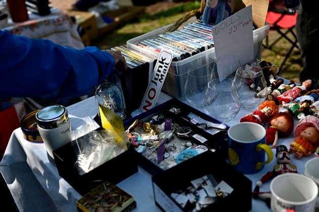 May 27, 2023, Ottawa, ON, CAN: Bargain hunters check out tables of goods set up at the Great Glebe Garage Sale, in Ottawa, on Saturday, May 27, 2023. The community event draws thousands of people to the Glebe, one of OttawaöÄÃ s heritage neighbourhoods, with vendors donating a percentage proceeds to the Ottawa Food Bank. Ottawa CAN - ZUMAc35_ 20230527_zaf_c35_021 Copyright: xJustinxTangx