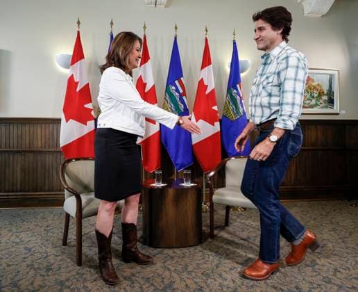 July 7, 2023, Calgary, AB, CANADA: Prime Minister Justin Trudeau, right, meets with Alberta Premier Danielle Smith in Calgary, Alta., Friday, July 7, 2023. Calgary CANADA - ZUMAc35_ 20230707_zaf_c35_026 Copyright: xJeffxMcintoshx